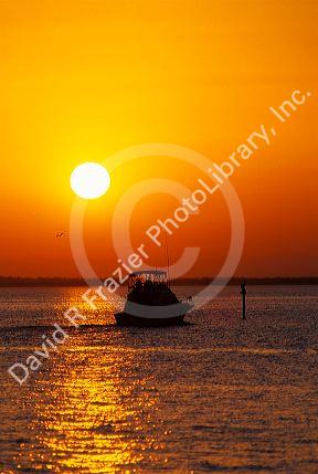 A fishing boat at sunset in Punta Gorda, Florida.