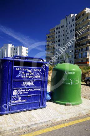 Recycle bins in Spain.  Paper on left and glass on right.