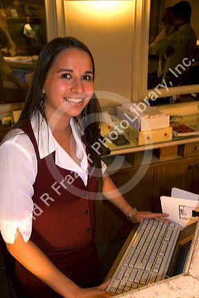Female employee at Hotel Colon in Buenos Aires, Argentina.