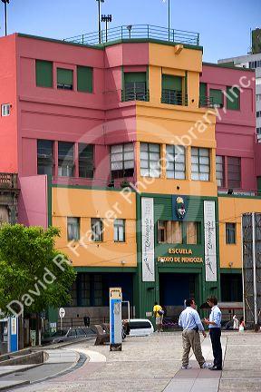 Colorful buildings in the La Boca area of Buenos Aires, Argentina.  School converted to an art gallery.