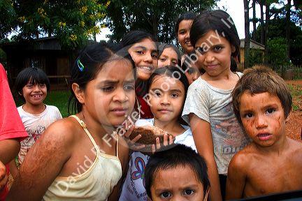 Children selling crystals and gemstones outside a mine in Libertad, Argentina.