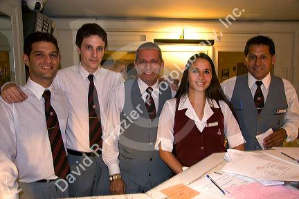Front desk staff at Hotel Colon in Buenos Aires, Argentina.
