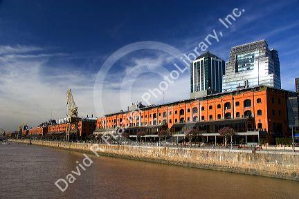 Modern office buildings and older red brick building at Puerto Modero in Buenos Aires, Argentina.