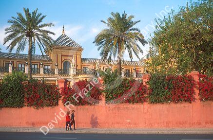 Strolling Paseo De Cristobal Colon in Seville, Spain.
