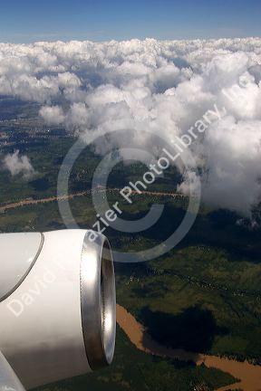 Airplane jet engine and clouds above Argentina north of Buenos Aires.