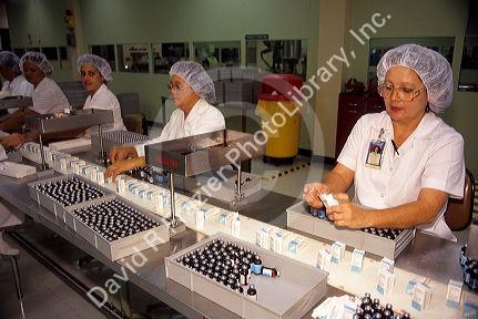 Workers packaging bottles at a pharmaceutical factory in Puerto Rico.
