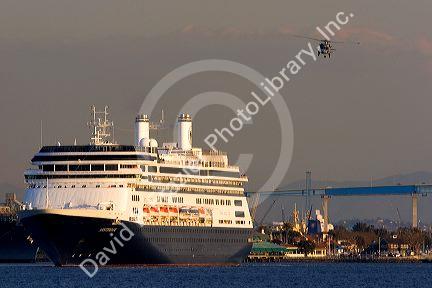 Cruise ship Amsterdam and military helicopter in San Diego, California.