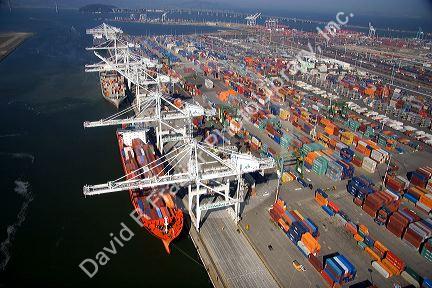 Container ships and cranes at the Port of Oakland, in the bay area of California.