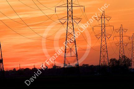 Sunset and silhouetted power transmission lines near Port Clinton, Ohio.