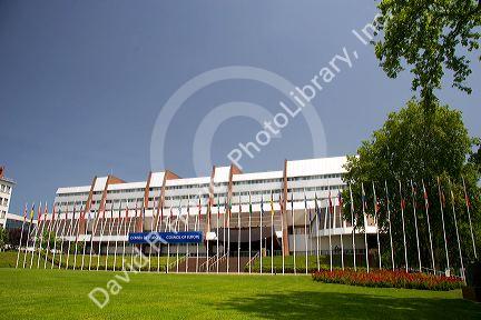 Council of Europe building and flags of member nations in Strasbourg, France.
