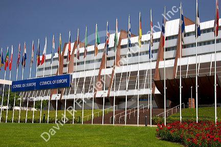 Council of Europe building and flags of member nations in Strasbourg, France.