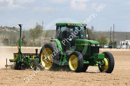 A tractor planting corn crop in Canyon County, Idaho.