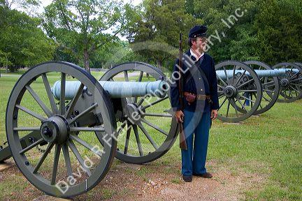 Civil war soldier reenactor and park ranger at Shiloh National Park battlefield, Tennessee.