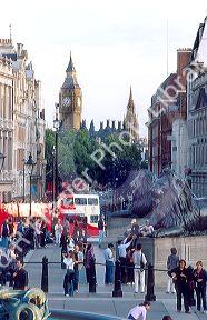 View along Whitehall Street in London England from Trafalgar Square with Big Ben and parliament in background.