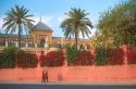 Strolling Paseo De Cristobal Colon in Seville, Spain.