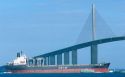 Ship passing under the Sunshine skyway suspension bridge over Tampa Bay, Florida.