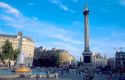 Trafalgar Square and Nelson's Column in London, England is crowded with local residents and tourists daily.