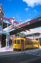Trolley  street car in Ybor City, Tampa, Florida.  Movie theater in background.