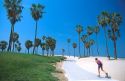 Woman rollerblading along Venice Beach, California.