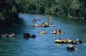 People float down the Boise River on inner tubes and rafts in Boise, Idaho.