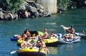 People float down the Boise River on inner tubes and rafts in Boise, Idaho.