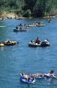 People float down the Boise River on inner tubes and rafts in Boise, Idaho.