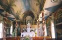 Interior of the St. Benedict painted church on Big Island of Hawaii.