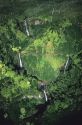 An aerial view of waterfalls on the island of Kauai, Hawaii.
