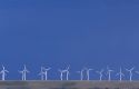 Windmills lined up along a ridge near Arlington, Wyoming.