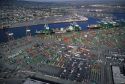 Container yard with ships at Port of Long Beach, California.