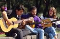 Mexican students playing guitars.