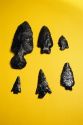 Obsidian arrowheads and tools.