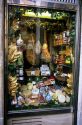 A store window display showing meats and cheeses in Rome, Italy.