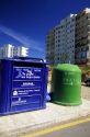 Recycle bins in Spain.  Paper on left and glass on right.