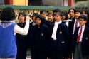 Chinese students in uniforms at a Buddhist Monestary school in Hong Kong.