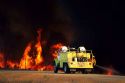 Firefighters battle a brush fire east of Boise, Idaho.