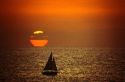 A sailboat at sunset in California.