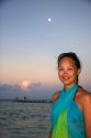 Woman on the beach at dusk on the island of Moorea. MR