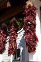 Dried chili peppers hang from a store front at Old Town, San Diego, California.