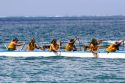 Tahitian women take part in an outrigger canoe pirogue race off the island of Moorea.