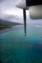 View of the lagoon surrounding Tahiti from a commuter aircraft.
