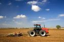 A tractor spring tilling a crop in Canyon County, Idaho.