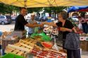 People shop at an open air market in Neuf-Brisach, France.