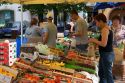 People shop at an open air market in Neuf-Brisach, France.