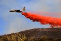 An airplane drops fire retardant on a fire in the Boise foothills, Idaho.