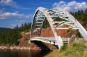 Arched iron suspension bridge along highway U.S. 191 at Flaming Gorge National Recreation Area in Utah.
