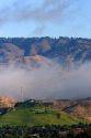 Fog lifting over the foothills and Governor's Mansion in Boise, Idaho.