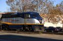 Amtrak train locomotive engine on the tracks in Oakland, California.