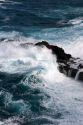 Waves crash in the pacific ocean off the island of Maui, Hawaii.