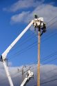 Electric power lineman installing new lines in Boise, Idaho.